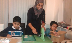 Shireen-Malik-and-her-sons-form-a-production-line-to-produce-600-badges-300x179